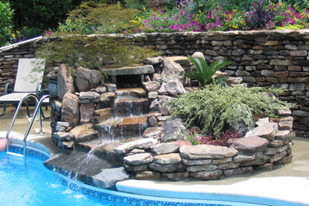 Pool side stone fountain and planter